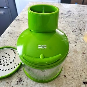 Brand new KUHN RIKON in green. Never used